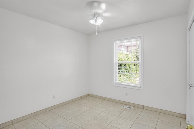 855 Birch St, Nixa, MO 65714 - spare room featuring ceiling fan and light tile patterned floors