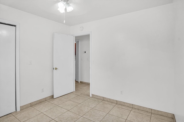 855 Birch St, Nixa, MO 65714 - unfurnished room with a ceiling fan and light tile patterned flooring