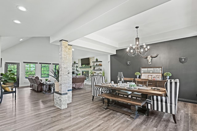 13030 County Lane 228, Oronogo, MO 64855 - dining room with ornate columns, a chandelier, wood finished floors, recessed lighting, and lofted ceiling