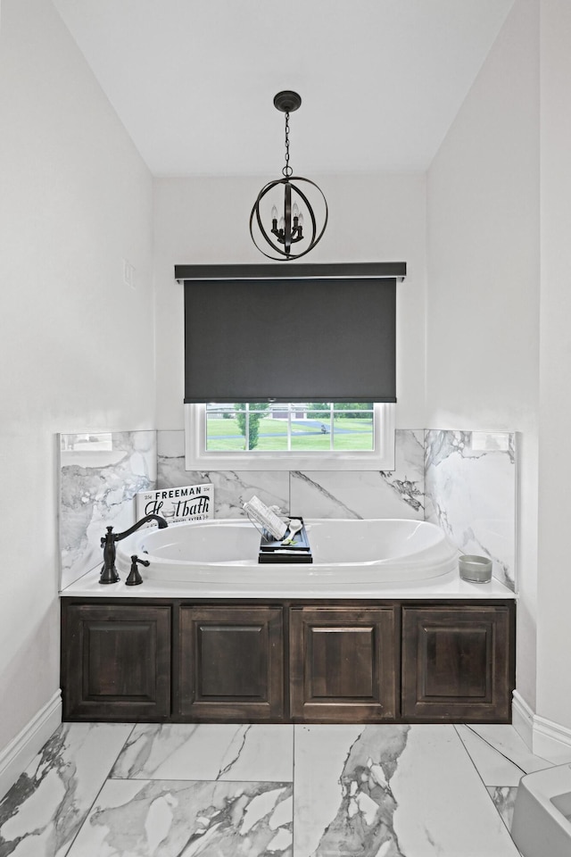 13030 County Lane 228, Oronogo, MO 64855 - full bathroom with a bath, a chandelier, and marble finish flooring