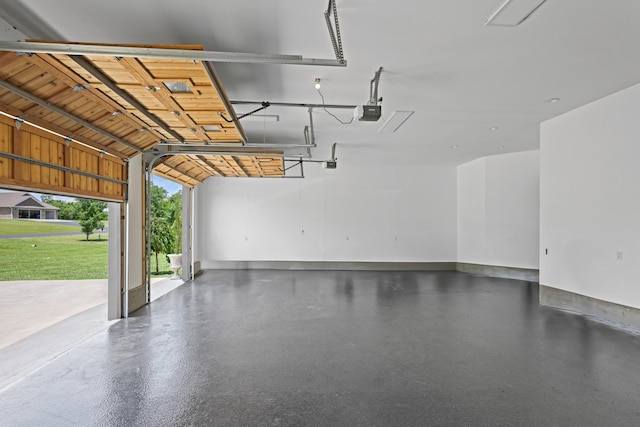 13030 County Lane 228, Oronogo, MO 64855 - garage featuring baseboards and a garage door opener