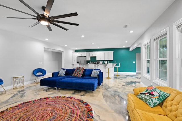 13030 County Lane 228, Oronogo, MO 64855 - living room featuring light marble finish floors, ceiling fan, and recessed lighting
