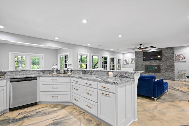 13030 County Lane 228, Oronogo, MO 64855 - kitchen featuring dishwasher, recessed lighting, open floor plan, a ceiling fan, and light stone counters