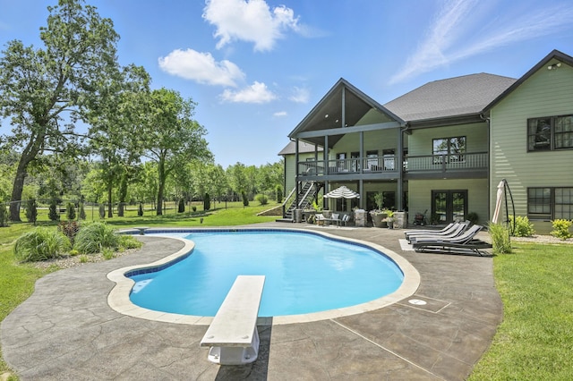 13030 County Lane 228, Oronogo, MO 64855 - outdoor pool with a patio area, a diving board, stairway, and french doors