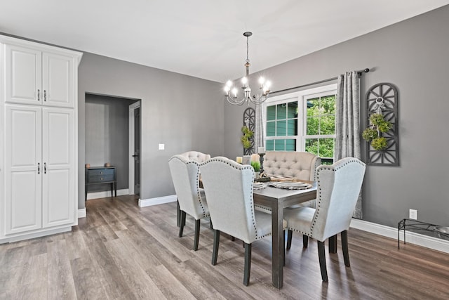 13030 County Lane 228, Oronogo, MO 64855 - dining area with a chandelier and light wood-type flooring