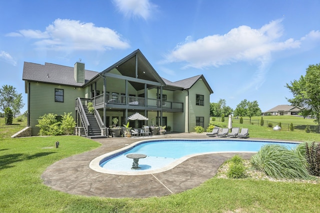 13030 County Lane 228, Oronogo, MO 64855 - back of property with a patio area, stairway, a chimney, an outdoor pool, and a balcony