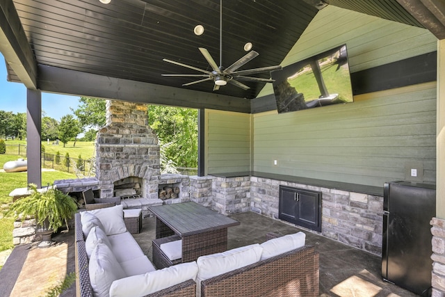 13030 County Lane 228, Oronogo, MO 64855 - view of patio / terrace featuring an outdoor living space with a fireplace and ceiling fan