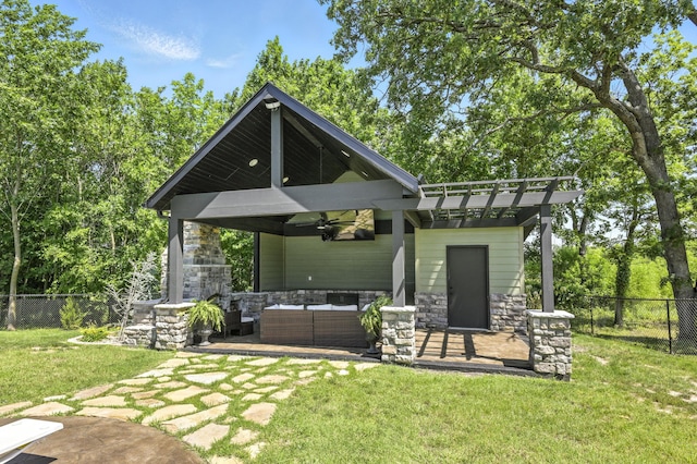 13030 County Lane 228, Oronogo, MO 64855 - rear view of house with stone siding, an outdoor living space with a fireplace, ceiling fan, and a patio