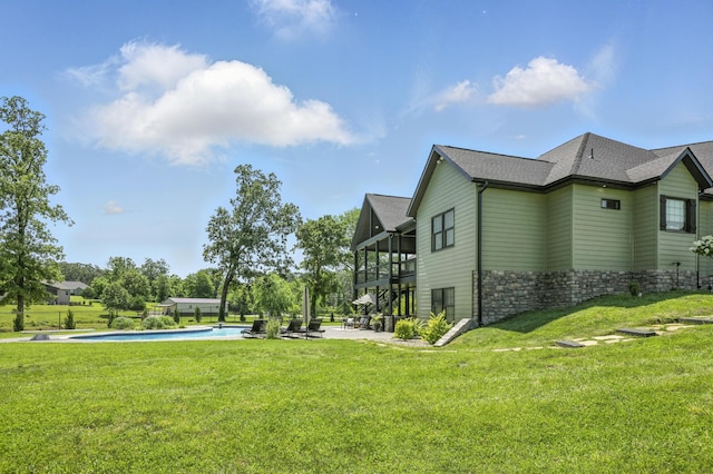 13030 County Lane 228, Oronogo, MO 64855 - view of grassy yard featuring a patio and an outdoor pool