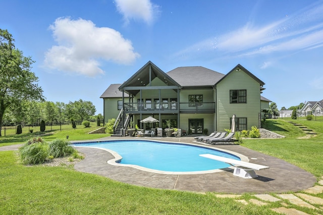 13030 County Lane 228, Oronogo, MO 64855 - rear view of house featuring stairway, a patio area, a yard, and an outdoor pool