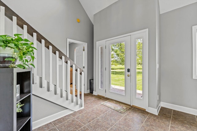 4201 N Farm Rd Unit 205, Strafford, MO 65757 - foyer entrance featuring high vaulted ceiling and baseboards