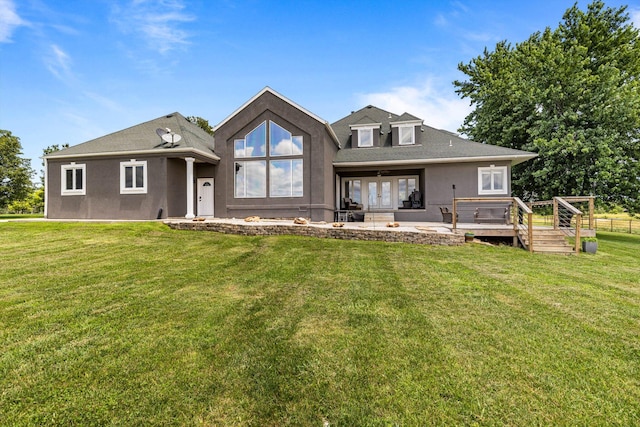 4201 N Farm Rd Unit 205, Strafford, MO 65757 - rear view of property featuring a yard, stucco siding, french doors, a wooden deck, and roof with shingles