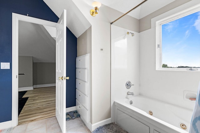 4201 N Farm Rd Unit 205, Strafford, MO 65757 - full bathroom featuring a combined bath / shower with jetted tub and tile patterned floors