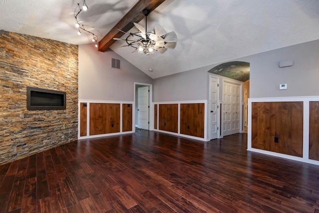 5795 S Wedgewood Ave, Springfield, MO 65810 - unfurnished living room with arched walkways, ceiling fan, and hardwood / wood-style floors