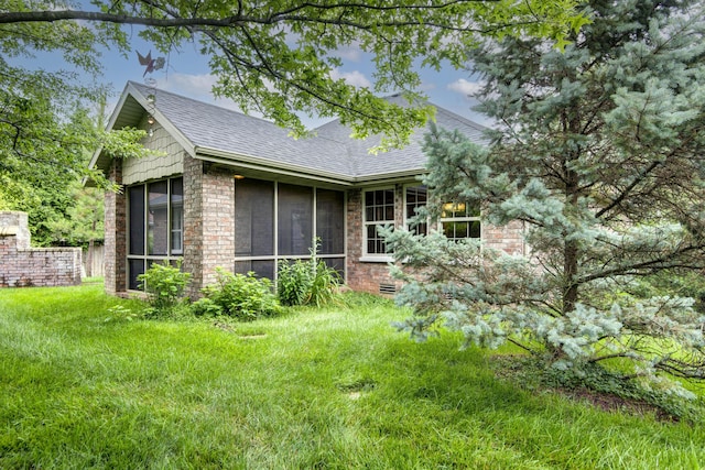 5795 S Wedgewood Ave, Springfield, MO 65810 - rear view of property with roof with shingles and a sunroom