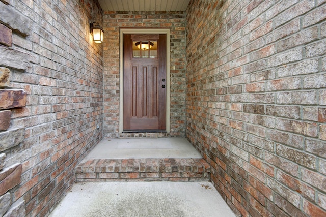 5795 S Wedgewood Ave, Springfield, MO 65810 - doorway to property featuring brick siding