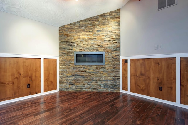 5795 S Wedgewood Ave, Springfield, MO 65810 - unfurnished living room with wood finished floors and vaulted ceiling