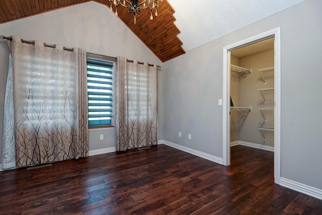 5795 S Wedgewood Ave, Springfield, MO 65810 - unfurnished bedroom featuring a chandelier, vaulted ceiling, wood finished floors, a walk in closet, and a closet