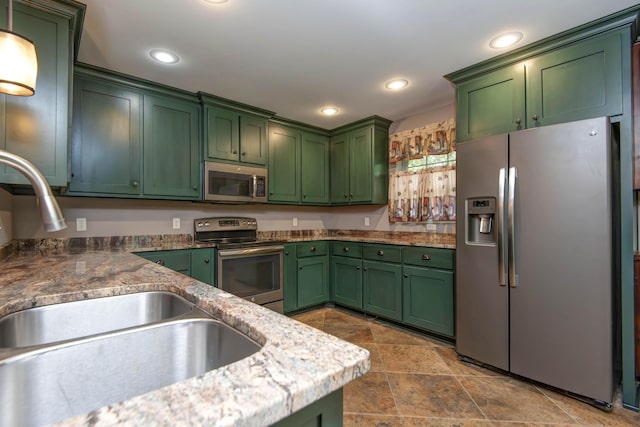 5795 S Wedgewood Ave, Springfield, MO 65810 - kitchen featuring appliances with stainless steel finishes, green cabinetry, recessed lighting, and stone finish floors