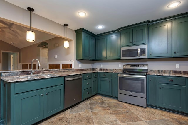 5795 S Wedgewood Ave, Springfield, MO 65810 - kitchen with appliances with stainless steel finishes, a peninsula, decorative light fixtures, stone finish floors, and dark stone countertops
