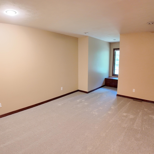 3352 W State Highway 76, Cape Fair, MO 65624 - unfurnished room with baseboards and light carpet