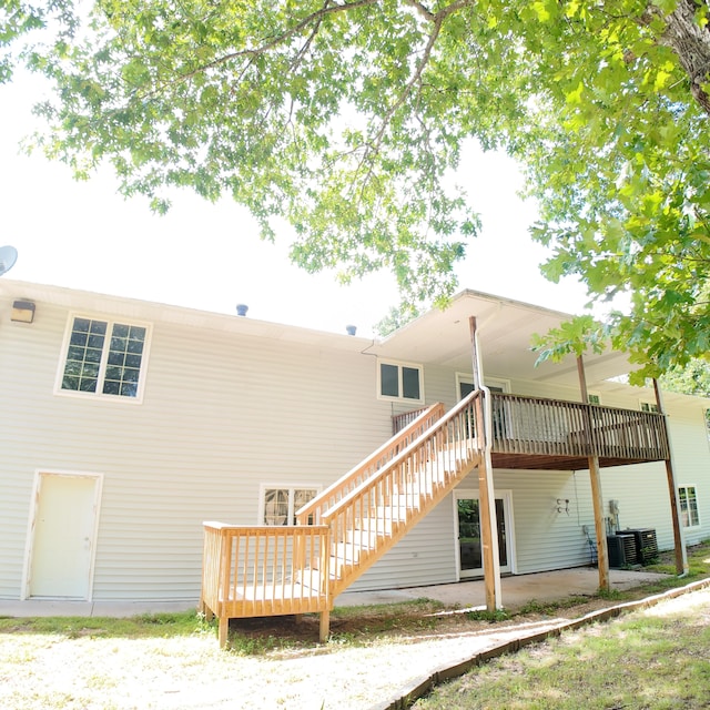 3352 W State Highway 76, Cape Fair, MO 65624 - rear view of property featuring a wooden deck, stairway, and a patio