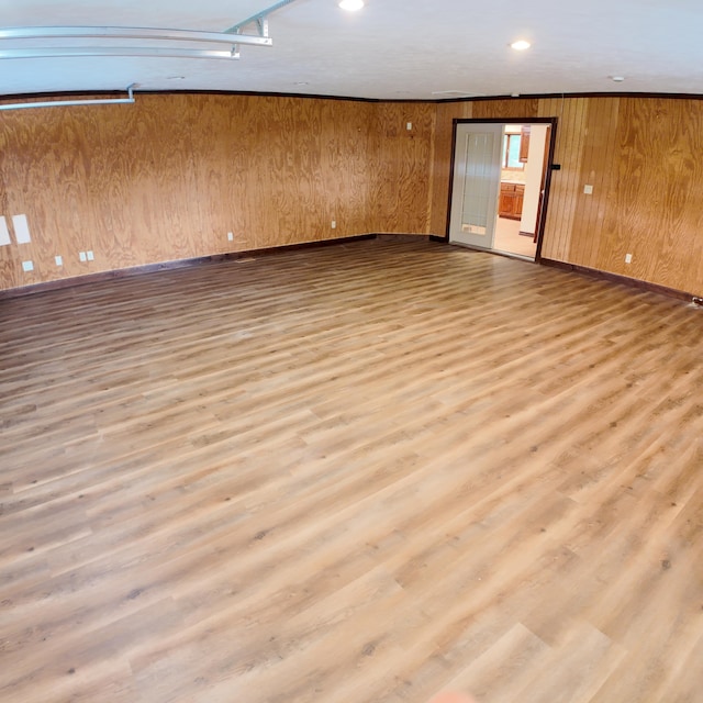 3352 W State Highway 76, Cape Fair, MO 65624 - spare room featuring wood finished floors, wooden walls, and recessed lighting