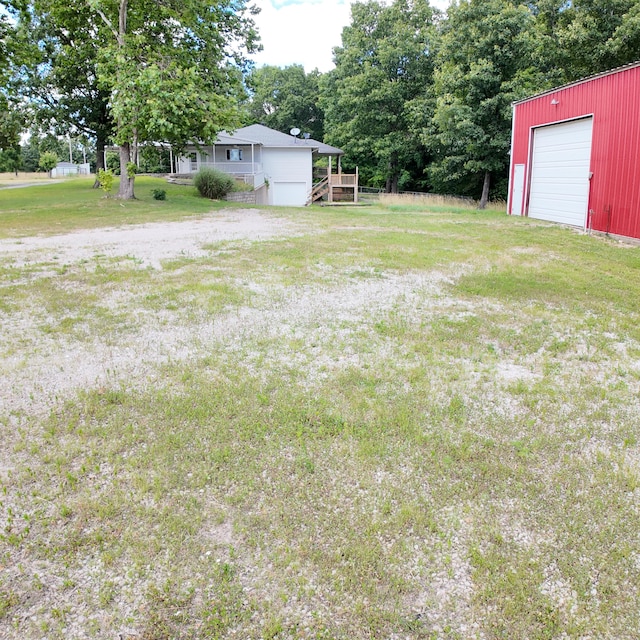 3352 W State Highway 76, Cape Fair, MO 65624 - view of grassy yard featuring an outdoor structure