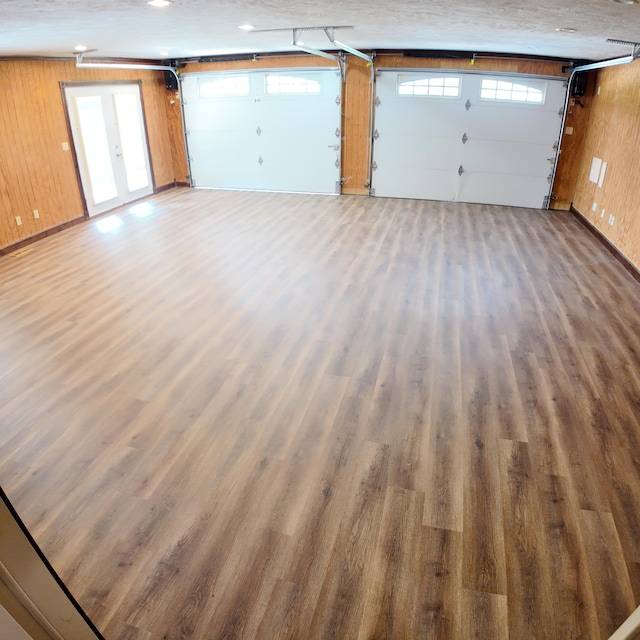 3352 W State Highway 76, Cape Fair, MO 65624 - garage featuring wooden walls and baseboards