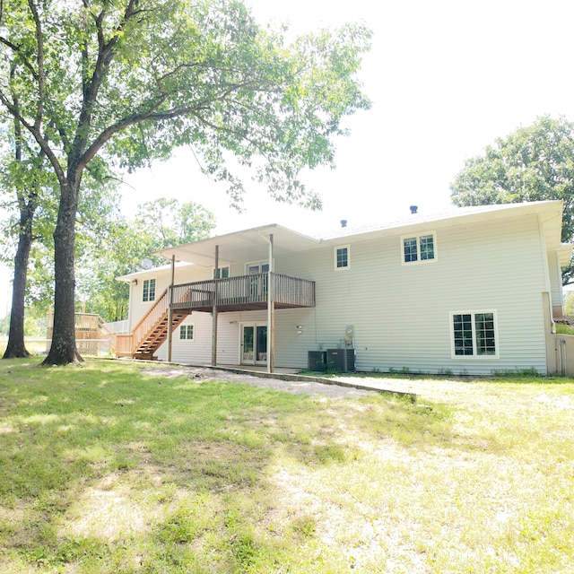 3352 W State Highway 76, Cape Fair, MO 65624 - back of property with stairs, a deck, and a yard