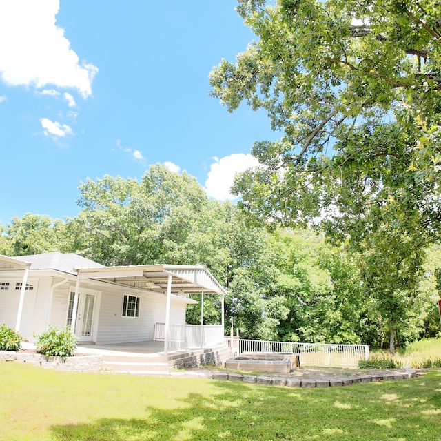 3352 W State Highway 76, Cape Fair, MO 65624 - back of property featuring a lawn