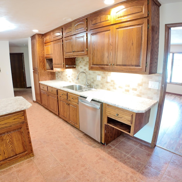 3352 W State Highway 76, Cape Fair, MO 65624 - kitchen featuring dishwasher, light countertops, backsplash, brown cabinets, and recessed lighting