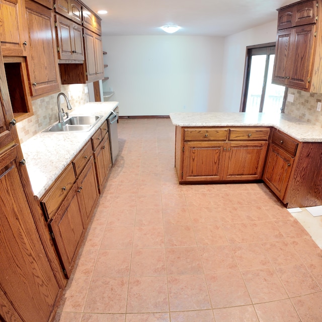3352 W State Highway 76, Cape Fair, MO 65624 - kitchen featuring a peninsula, decorative backsplash, stainless steel dishwasher, brown cabinets, and recessed lighting