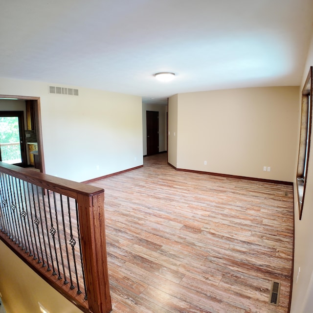 3352 W State Highway 76, Cape Fair, MO 65624 - spare room featuring light wood-type flooring and baseboards