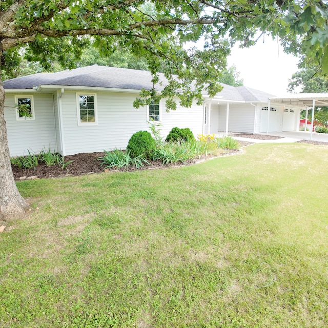 3352 W State Highway 76, Cape Fair, MO 65624 - view of property exterior with a lawn, a carport, and roof with shingles