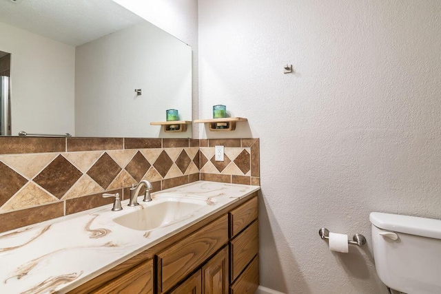 13 Keel Ln Unit 7, Kimberling City, MO 65686 - bathroom featuring vanity and tasteful backsplash