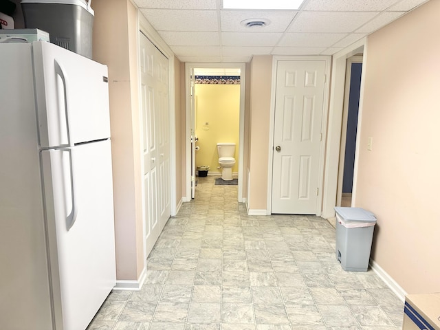 26569 County Road 225, Flemington, MO 65650 - hall featuring a paneled ceiling and water heater