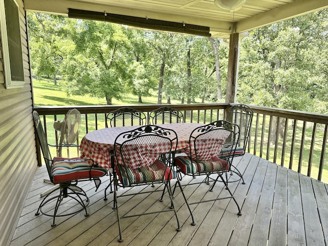 26569 County Road 225, Flemington, MO 65650 - deck featuring outdoor dining space and a lawn