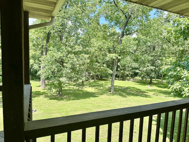 26569 County Road 225, Flemington, MO 65650 - view of green lawn with a balcony and view of scattered trees