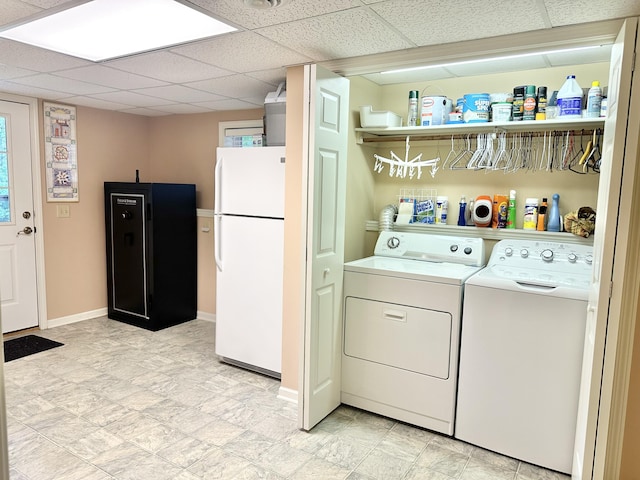 26569 County Road 225, Flemington, MO 65650 - laundry area featuring washer and dryer and baseboards
