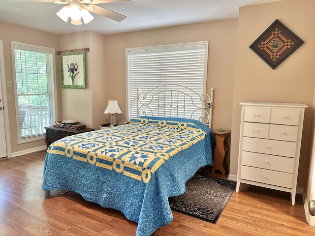 26569 County Road 225, Flemington, MO 65650 - bedroom featuring wood finished floors and ceiling fan