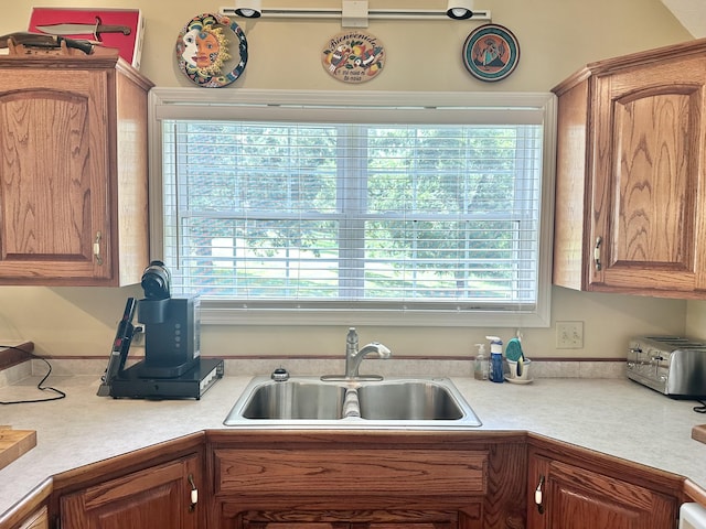 26569 County Road 225, Flemington, MO 65650 - kitchen with light countertops and brown cabinets