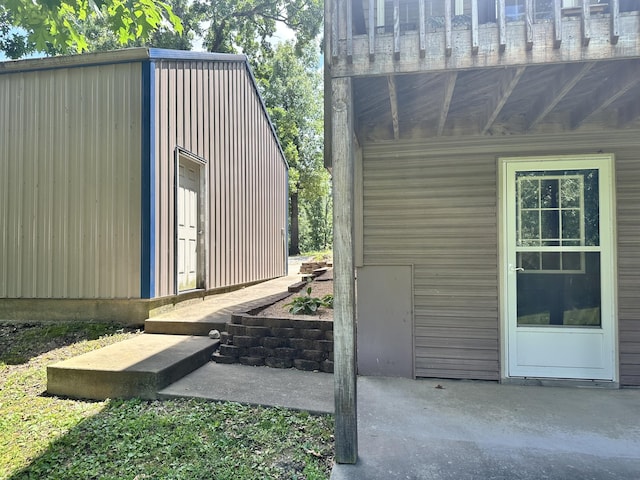 26569 County Road 225, Flemington, MO 65650 - view of side of property featuring an outdoor structure and a patio area