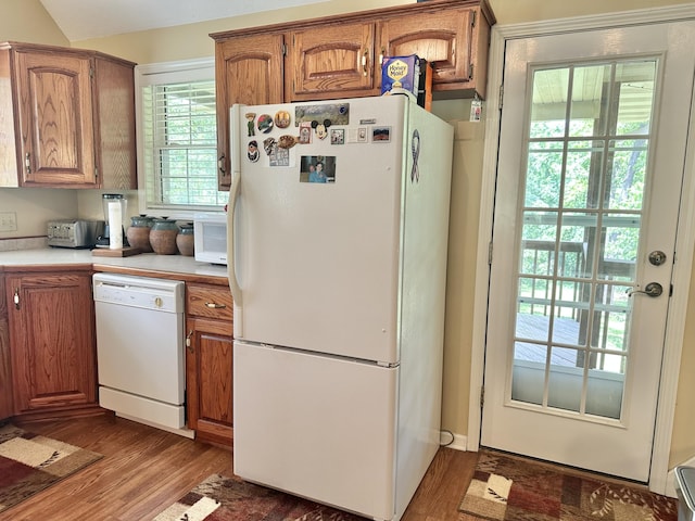 26569 County Road 225, Flemington, MO 65650 - kitchen featuring white appliances, wood finished floors, brown cabinets, and light countertops