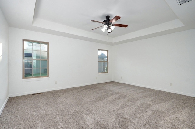 2000 E Greenwich Dr, Ozark, MO 65721 - unfurnished room featuring a tray ceiling, ceiling fan, and carpet flooring