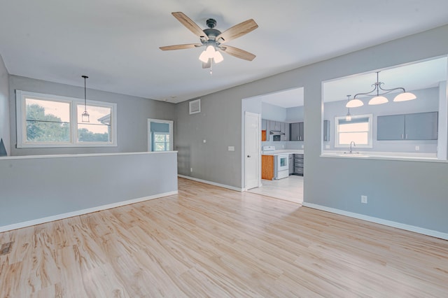 4147 E Kellis Ct, Springfield, MO 65802 - unfurnished room with a ceiling fan and light wood-style flooring