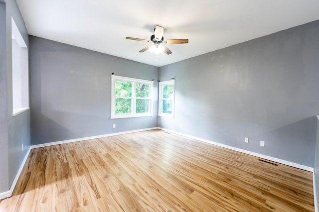 4147 E Kellis Ct, Springfield, MO 65802 - spare room with a ceiling fan and light wood-style flooring