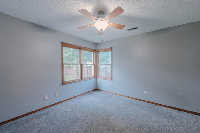 4147 E Kellis Ct, Springfield, MO 65802 - spare room featuring carpet, a ceiling fan, and a textured ceiling