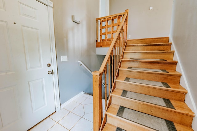 4147 E Kellis Ct, Springfield, MO 65802 - staircase featuring tile patterned floors and baseboards
