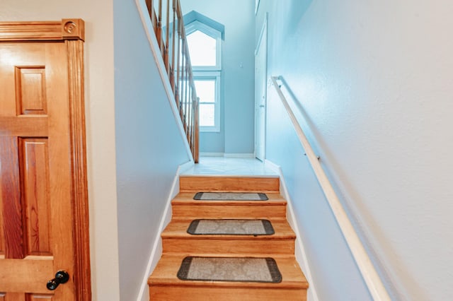 4147 E Kellis Ct, Springfield, MO 65802 - stairway featuring baseboards